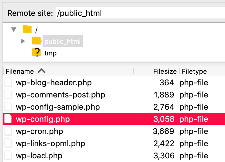 The wp-config.php file accessed via FileZilla.