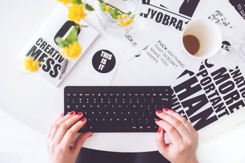keyboard with blogging materials and coffee