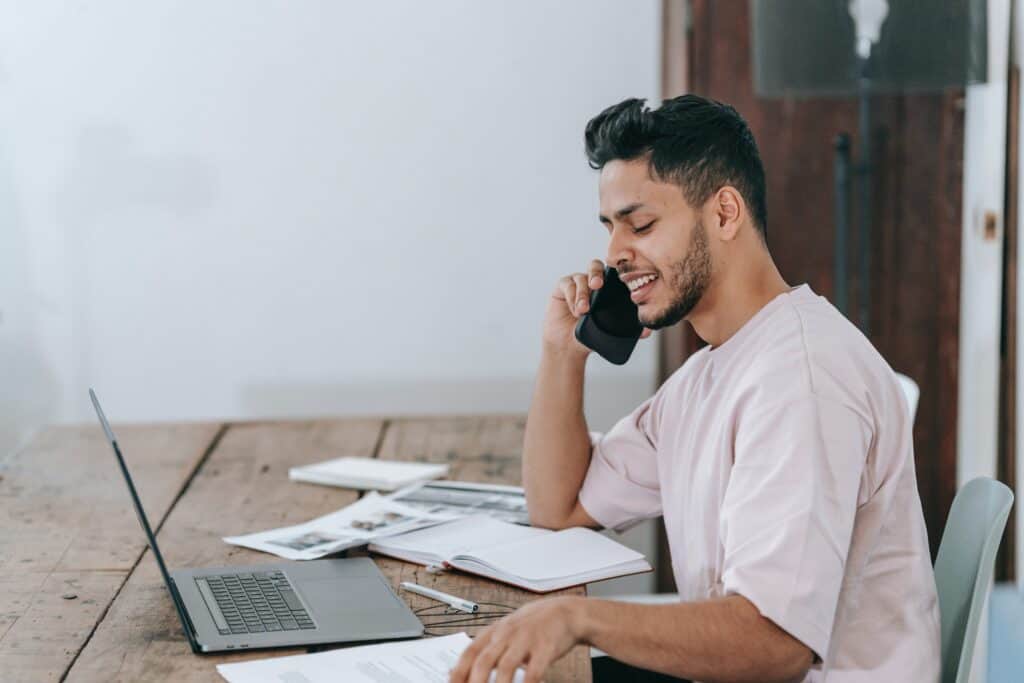 Entrepreneur working remote at desk. 