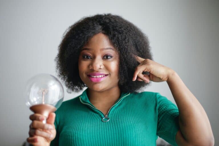 Creative woman with big idea lightbulb