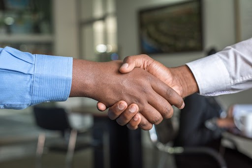 Close up of two men shaking hands